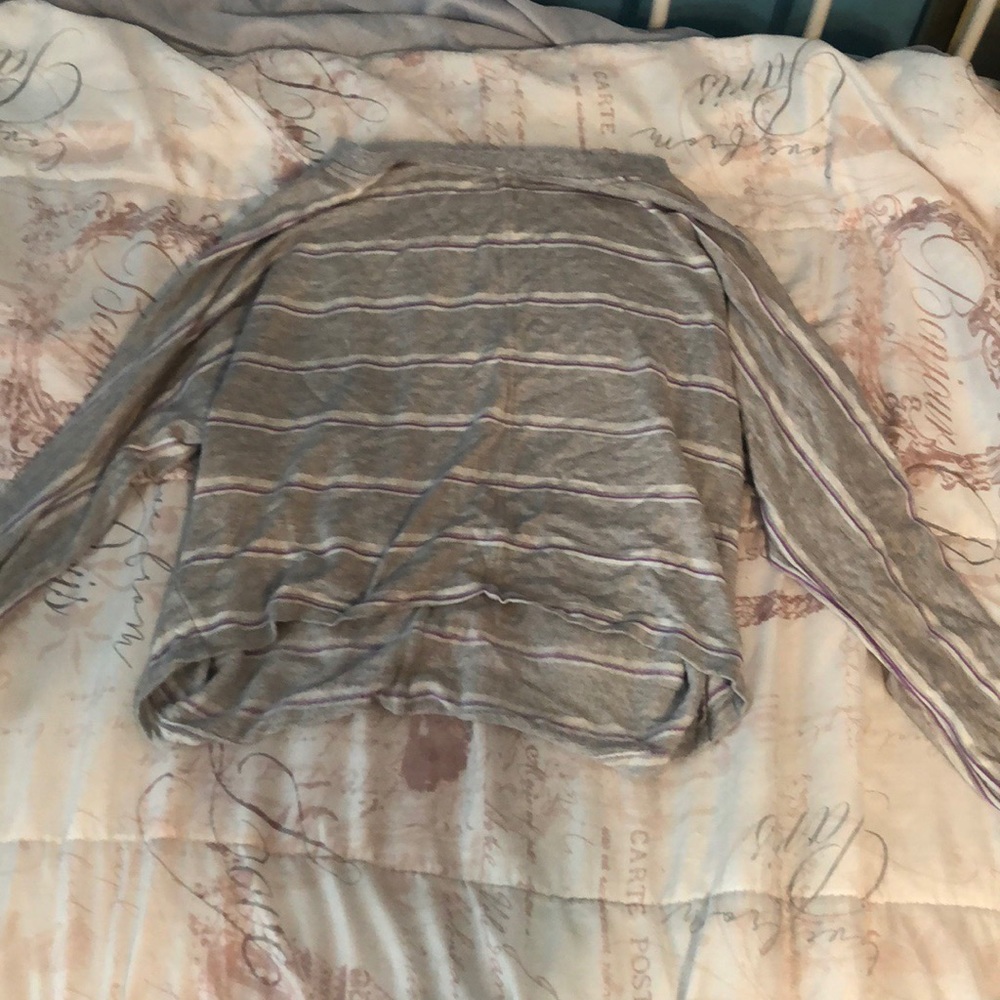 White purple and gray sweatshirt.